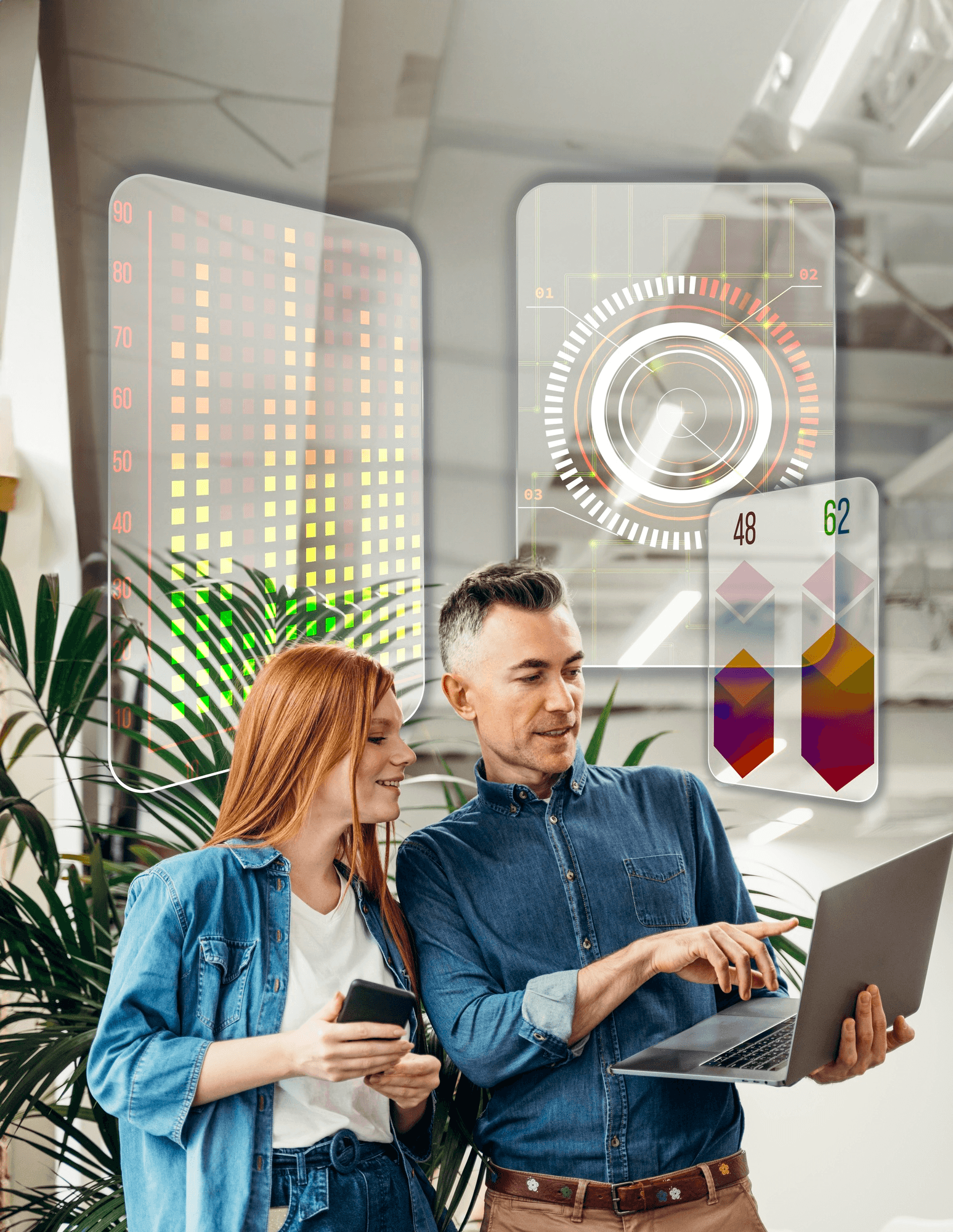 Two colleagues reviewing data on a laptop while company and contact data panels surface alongside them